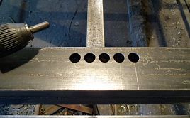 Расточка отверстий под ригель замка входной двери